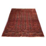 An early 20th Century Turkoman Bokhara rug, 1.49m x 1.10m.
