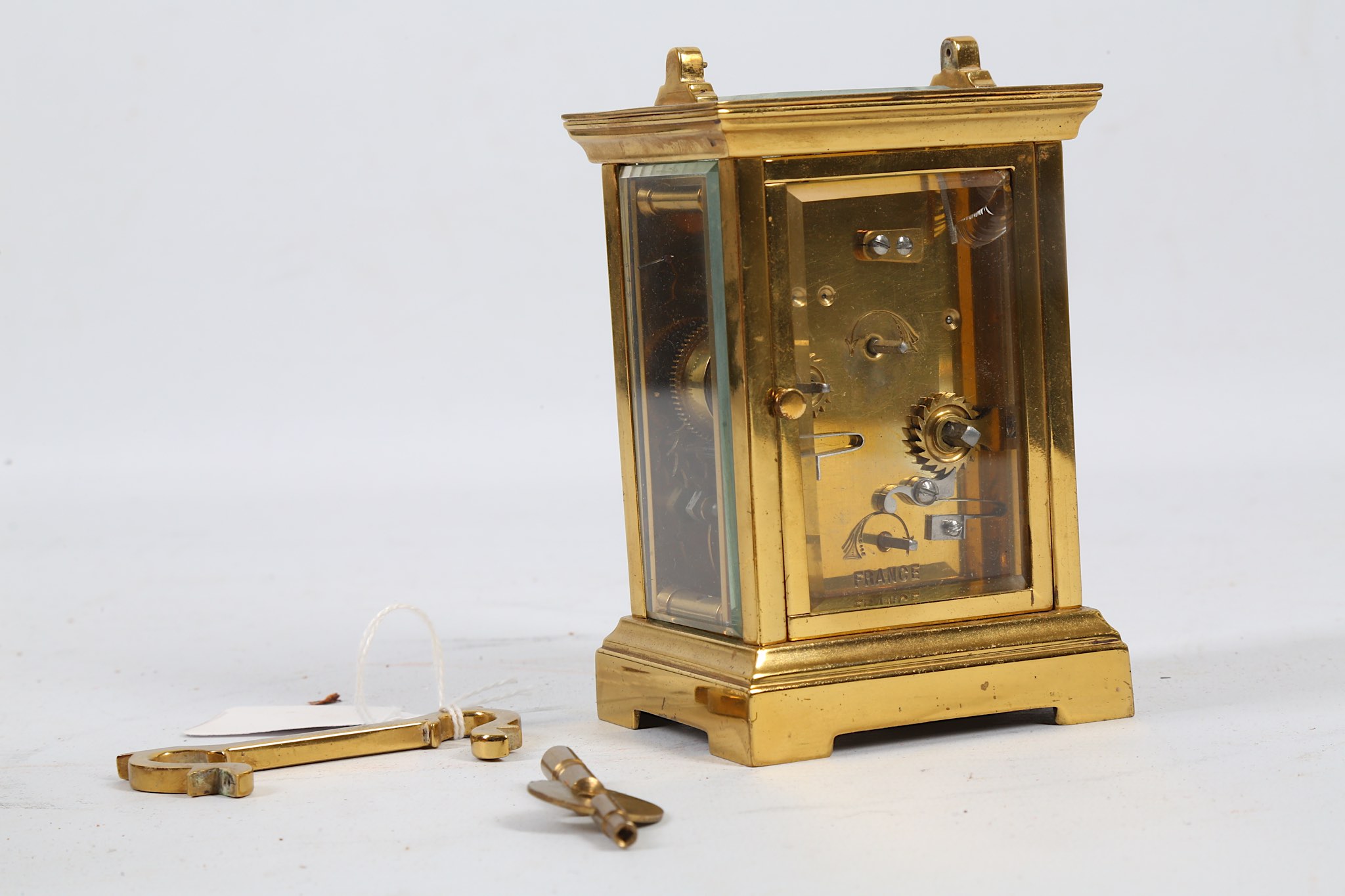 An early 20th Century brass carriage clock, with alarm and leather case, together with another brass - Image 5 of 6