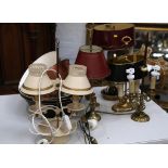 Five brass and Coleware two branch Bouillotte lamps, with six toleware and fabric shades.