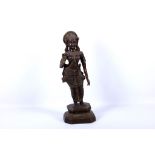 A 19th Century Indian cast bronze figure of a female deity on base, 55cm high.