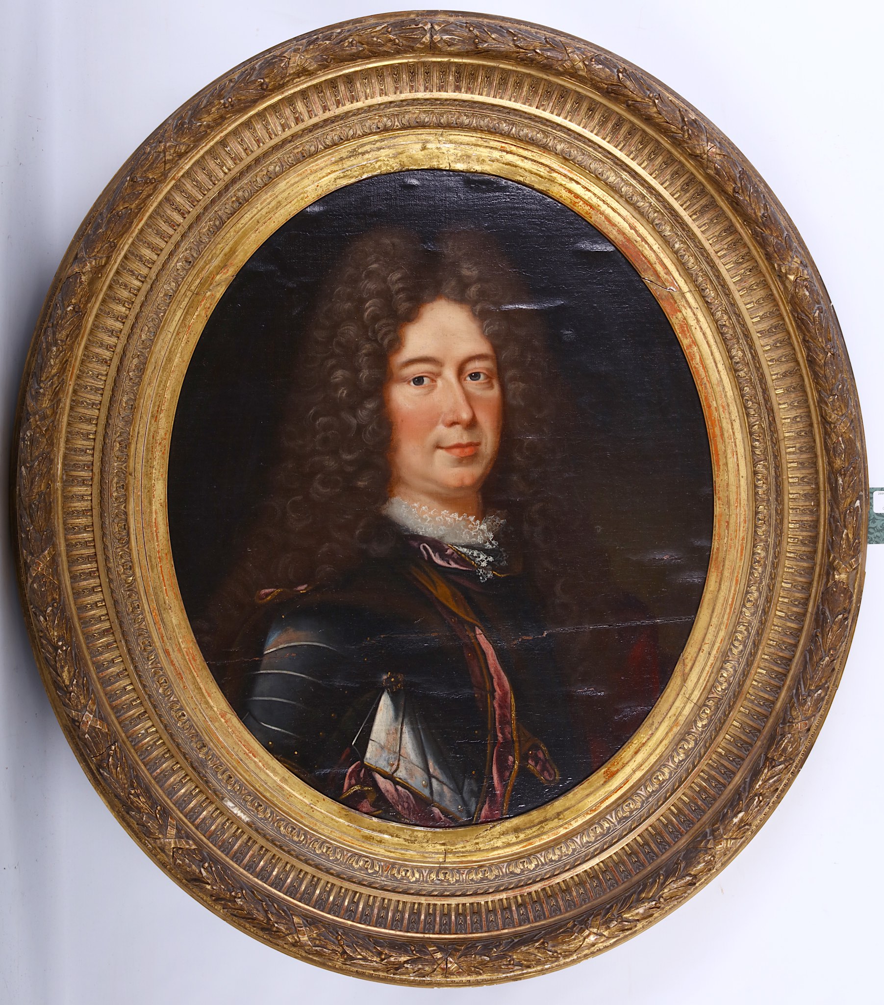 Circa 18th Century, French school. 'Portrait of a Man in Armour'. The sitter wearing a purple sash