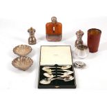 A set of six George III silver teaspoons, cased, a pair of late Victorian silver shell shape