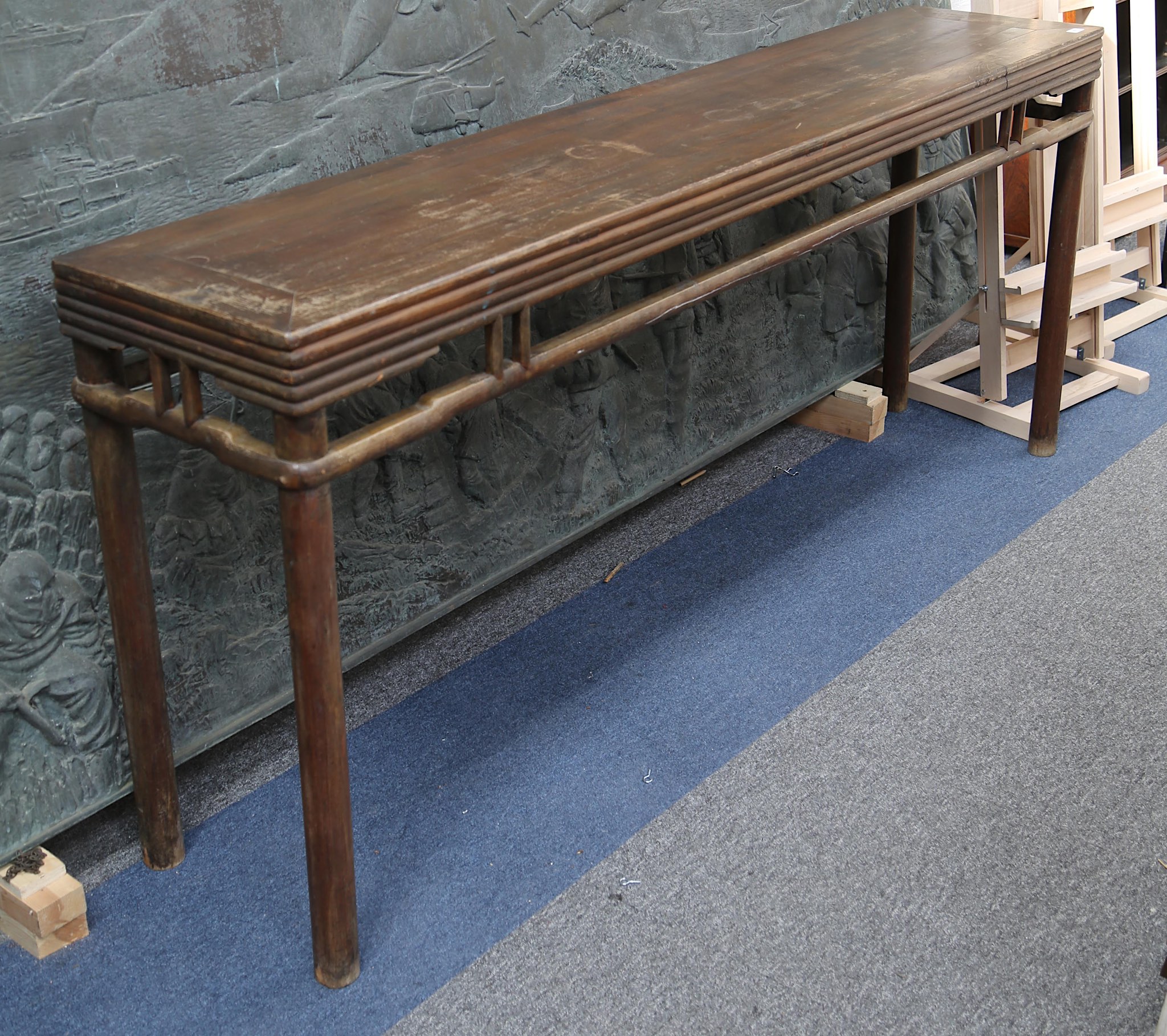 An early 20th Century Chinese altar table, L: 206cm x D: 43cm x H: 88.5cm.