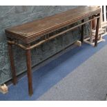 An early 20th Century Chinese altar table, L: 206cm x D: 43cm x H: 88.5cm.