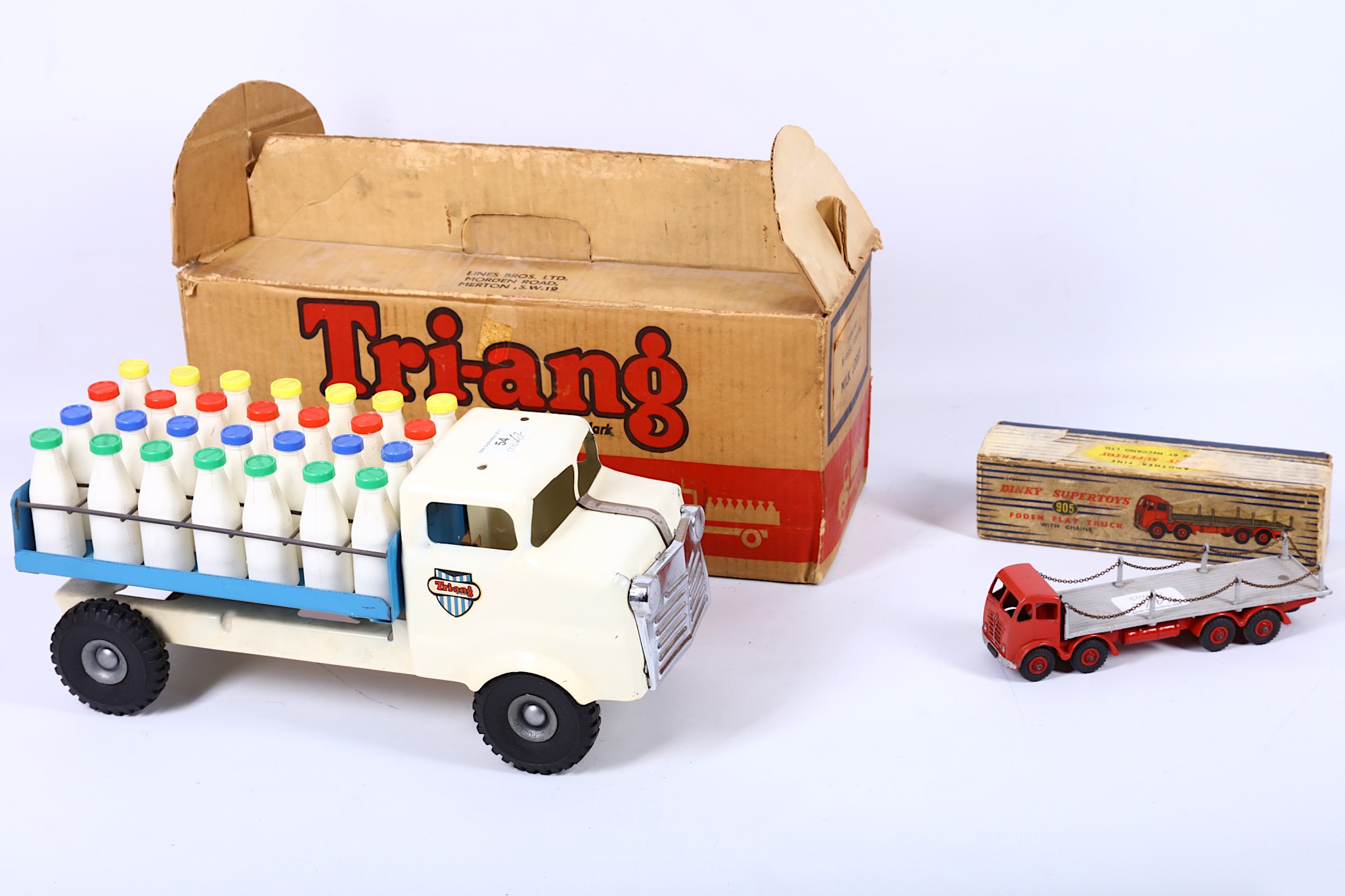 A Triang Junior Diesel Series, milk lorry complete with milk bottles, supplied in its original