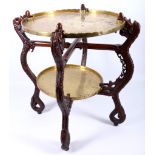 A Hongmu and brass folding occasional table, with two circular trays incised with dragons, the