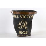 An early Georgian leather bounded fire bucket, having brass circular top, inscribed later,