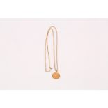 A gold Zodiac pendant necklace, The 18 carat yellow gold Cancer pendant, suspended from an 18