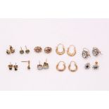 A group of earrings, including a pair of cabochon opals, a pair of amethysts, two pairs of small