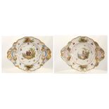 A RARE PAIR OF FRENCH (NYON) PORCELAIN PLATTERS, 1781-1813, the centres of both painted in Meissen