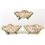 THREE MEISSEN PORCELAIN BASKETS, 19th century, each of quatrelobed form with pierced lattice