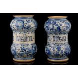 A PAIR OF ITALIAN MAIOLICA BLUE AND WHITE DRUG JARS, 19th century, profusely painted in blue with
