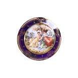 A VIENNA STYLE PORCELAIN CABINET PLATE, late 19th century, the centre painted with three female