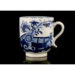 A LOWESTOFT PORCELAIN COFFEE CUP, circa 1765-70, of plain U-shape, painted in blue with the 'Chinese