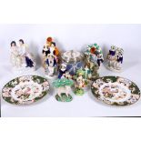 A collection of ten 19th Century Staffordshire pottery figures, to include two bocage figures, a