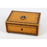 An early 19th Century French needlework box, complete with silver and mother of pearl fittings,