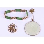 A collection of jewellery, Including a nephrite bracelet, accented by Chinese characters, a carved