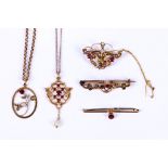 A collection of Art Nouveau jewellery, Including three brooches and two pendant necklaces, most