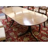 A Regency style mahogany 'D' end dining table, of small size, with central extra leaf, 212cm long.