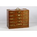 A mid 20th Century, oak cased Chinese jewellery box, having five drawers, the interior fitted with