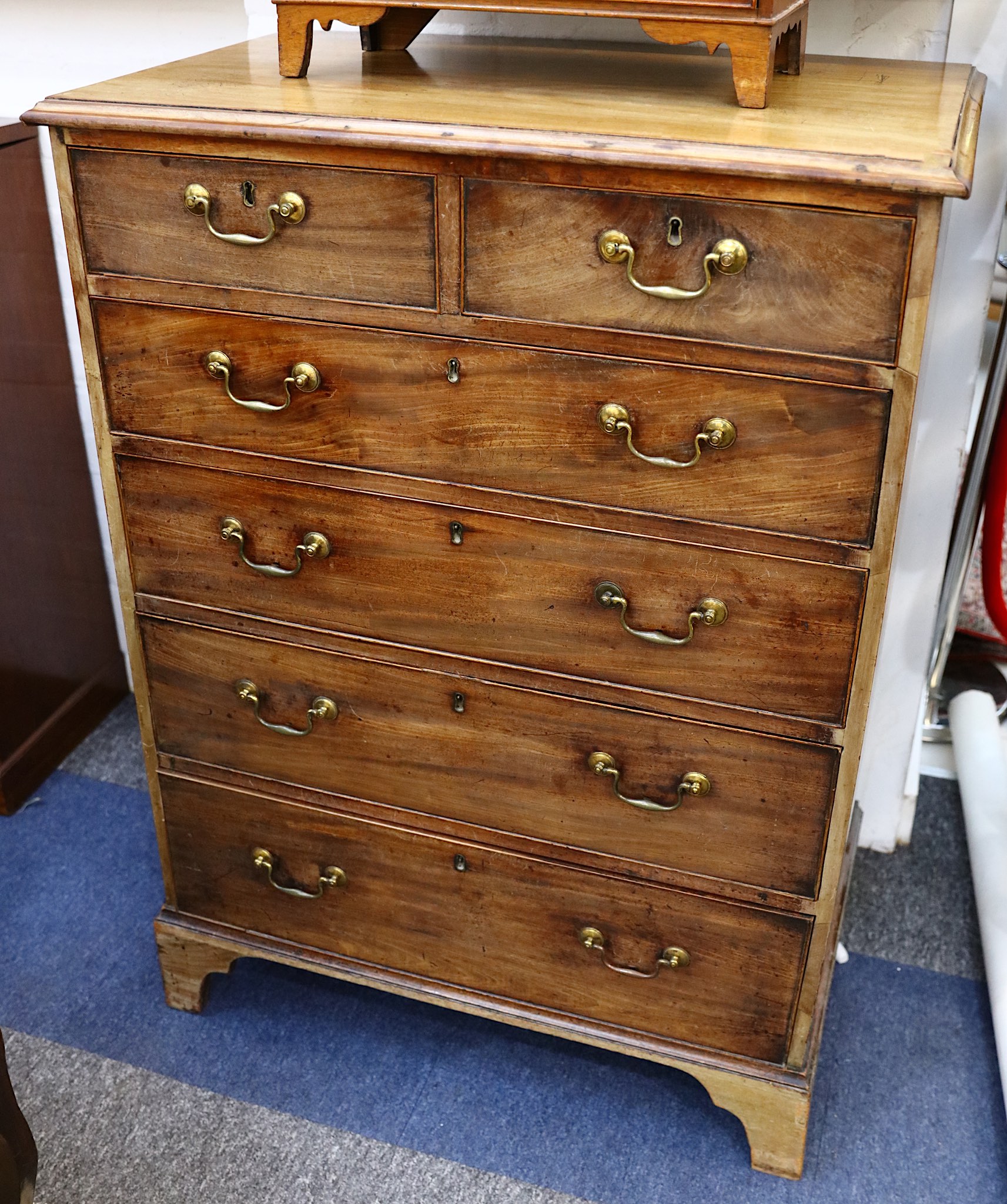 A 19th Century mahogany chest of two short and four long drawers, raised on bracket feet, 88cm