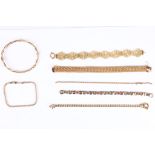 A collection of seven gold bracelets, including one broken and one bangle, all stamped 375 or with