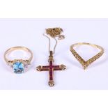 A small collection of jewellery, Including a cross and two rings, one set with blue topaz, cross