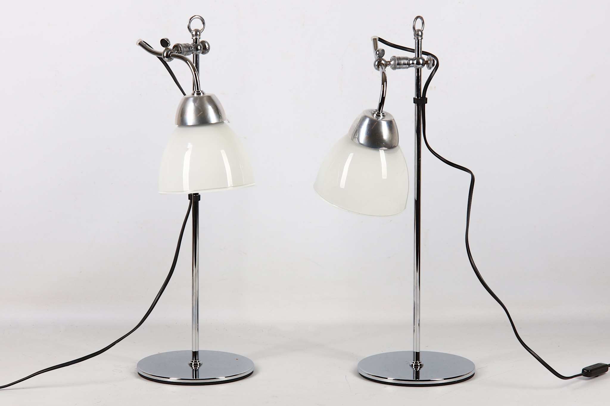 A pair of modern design nickel plated table lamps, in almost unused condition from Conran shop, 52cm
