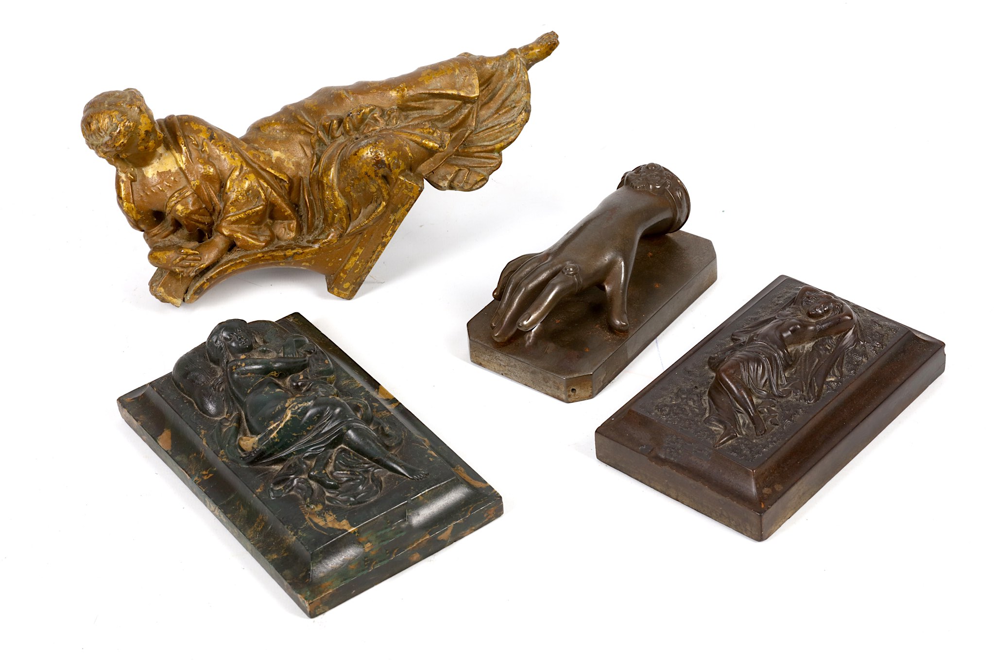 Two 19th Century, moulded scagliola memorial plaques with reclining maidens, sold with a bronze hand