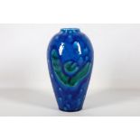 Italian Alvino Bagni baluster pottery vase circa 1974 decorated with floral branches on a blue