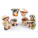 A collection of 8 Royal Doulton character Toby jugs, to include Falstaff, Pied Piper D6403, Capt.