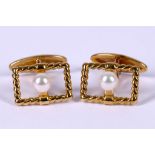 A pair of cultured pearl cufflinks, by Mikimoto, maker's mark M, stamped 750, maker's case