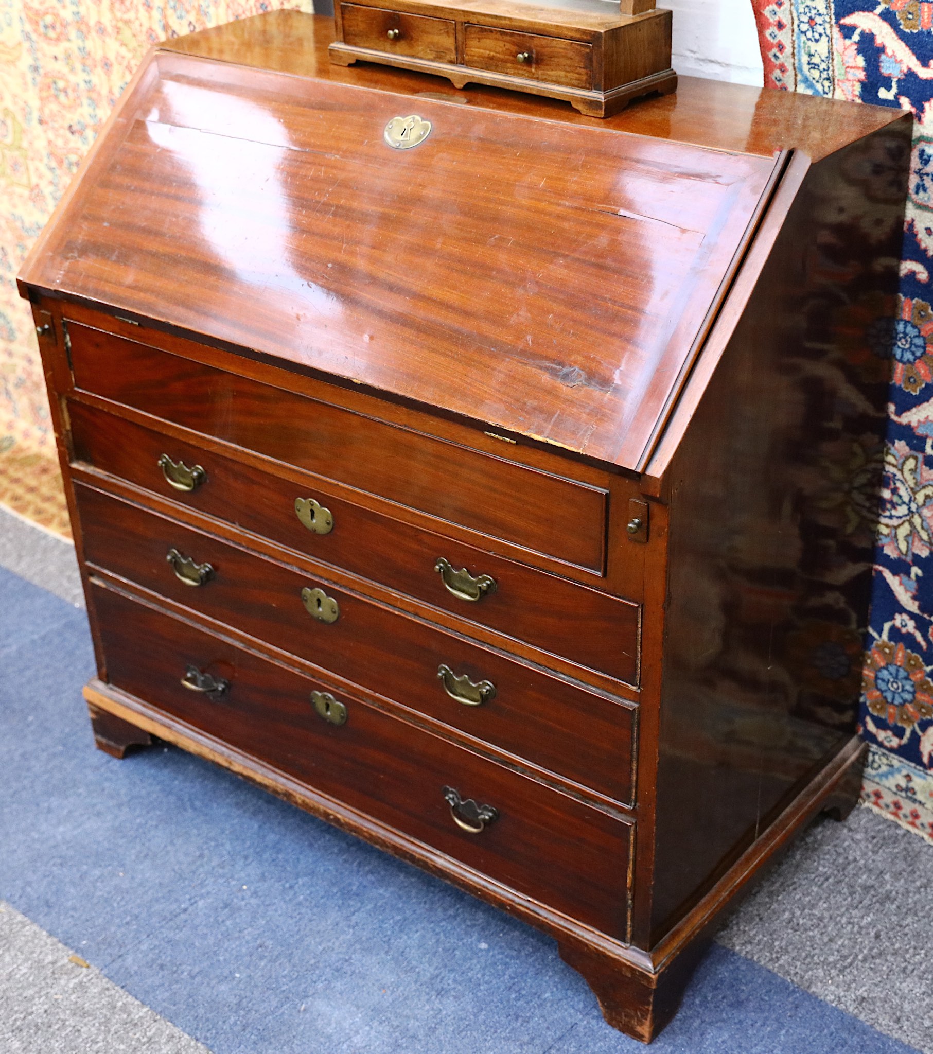 A Georgian mahogany bureau, with fall front concealed fitted interior, 92cm wide.