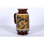 Jean Charles Cazin for Fulham Pottery. A late 19th Century stoneware jug applied with flowering