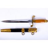 A Russian Soviet Nowal dagger and sheath, in leather and gilt.