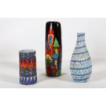 Two Italian Fanciullacci pottery vases and one other by Elio Schiavon decorated with roof spires,