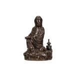 A LARGE CHINESE SILVER INLAID BRONZE GUANYIN. Signed Shisou. Seated in lalitasana beside a vase