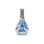 A CHINESE BLUE AND WHITE ‘PEACOCK’ BOTTLE VASE. Ming Dynasty. The pear-shaped body painted with the