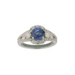 A sapphire and diamond cluster ring