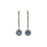 A pair of sapphire and diamond pendent earrings