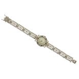 A sapphire and diamond wristwatch