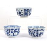 Three Chinese Kangxi blue and white porcelain teabowls.