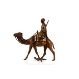 An Austrian cold painted orientalist bronze of an Arab riding a camel, in the manner of Bergman,
