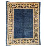 A FINE ARTS & CRAFTS DESIGN CARPET approx: 9ft. x 7ft.1in.(247cm. x 215cm.) The shaded sea-blue