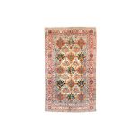 A BAKHTIARI CARPET, WEST PERSIA approx: 10ft.2in. x 7ft.(309cm. x 201cm.) The filed with