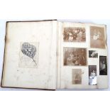 ALBUM. [c. 1900-1920]. Folio. An album of pasted in photographs and ephemera, including family