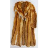 A 1970's full length fox fur coat.