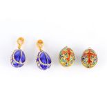 Four enamelled egg charms, two with paste detail and stamped 925 (4)