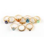 A collection of ten gem and imitation gem-set rings, nine with UK hallmarks for 9ct and one for 14ct