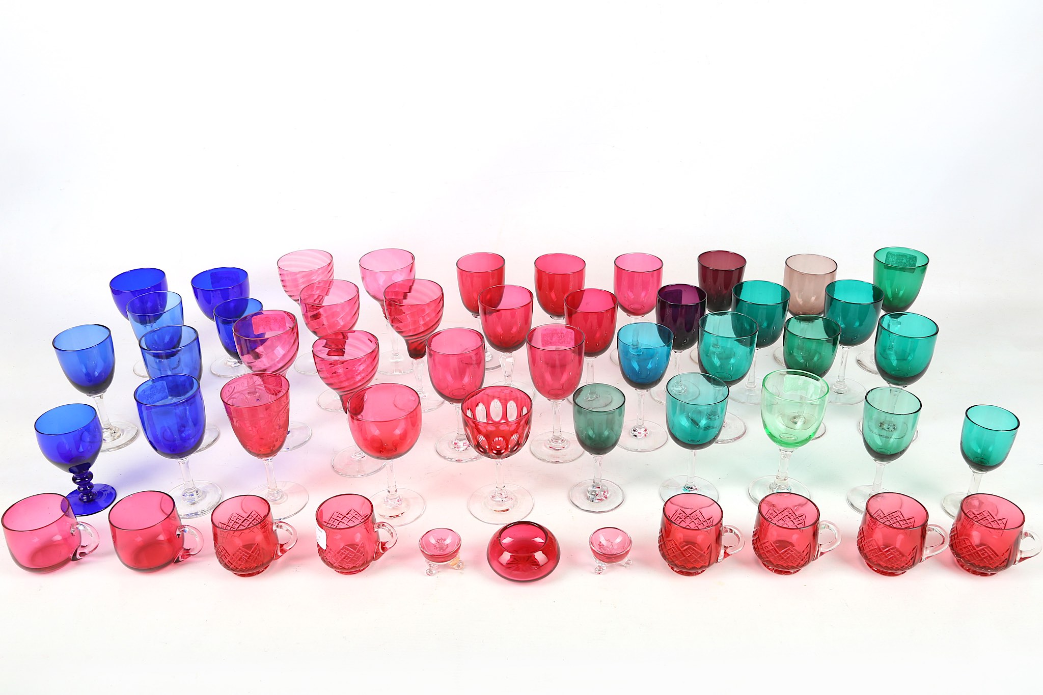 WITHDRAWN!!  A collection of coloured glassware, late 19th Century and later, to include three large